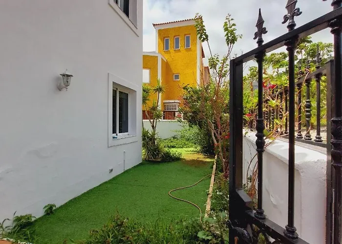 House With A Tropical Garden