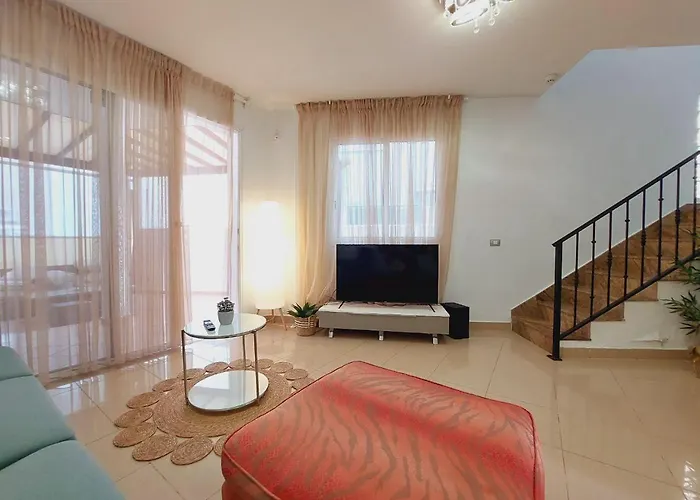 House With A Tropical Garden