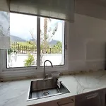 House With A Tropical Garden