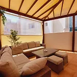 House With A Tropical Garden
