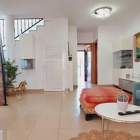 House With A Tropical Garden